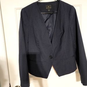 Fun navy & white pinstripe work suit that will keep you impressing.